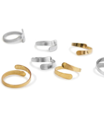 anillo cruzado, anillos medellin, anillo en acero, anillo en bronce con baño en oro