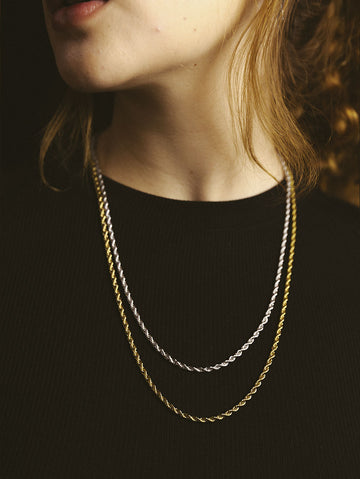 collar lazo dorado y plateado en acero