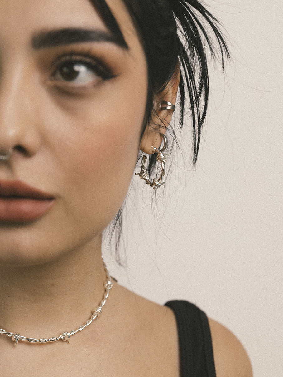 Mini earrings with spikes